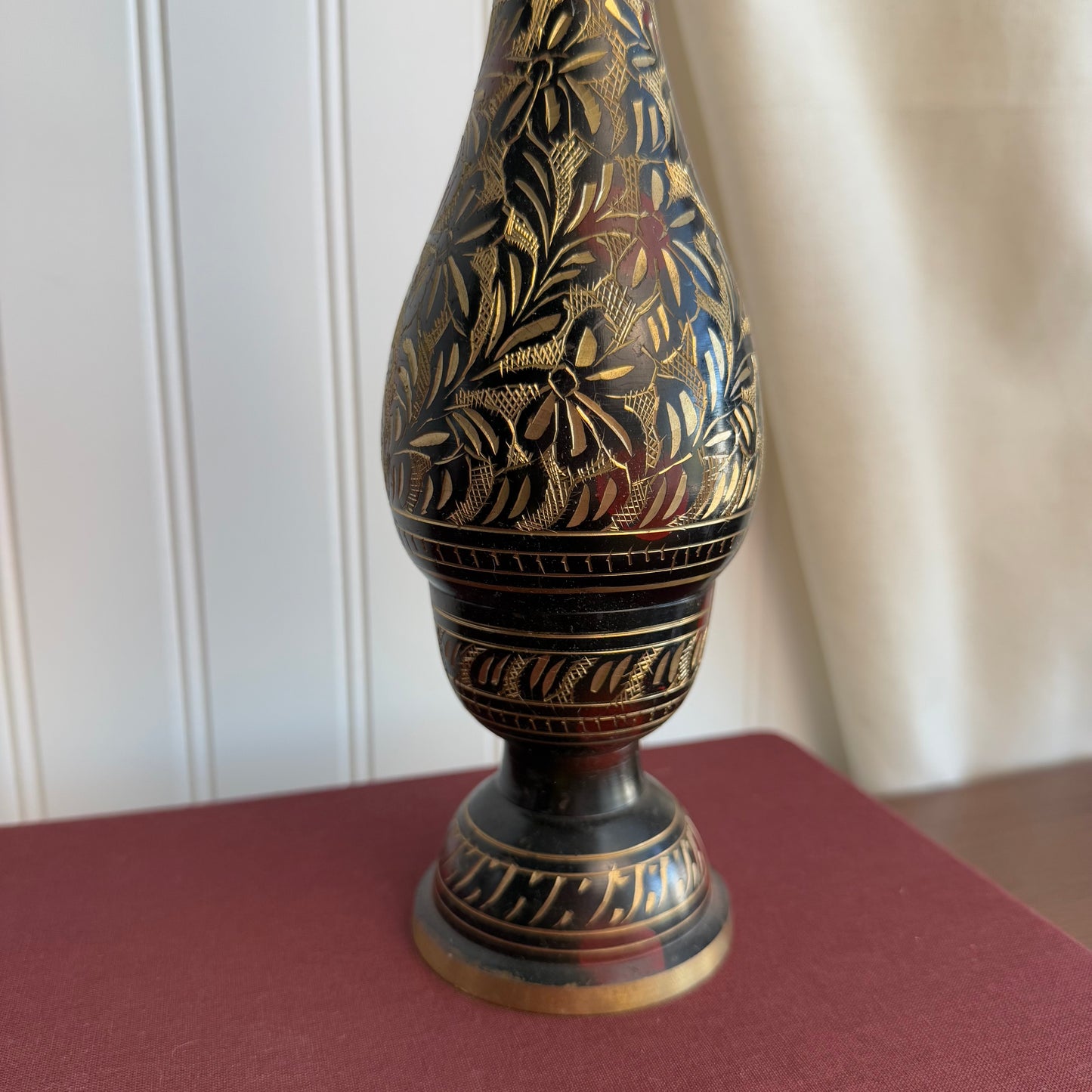 Brass vase with black etched details