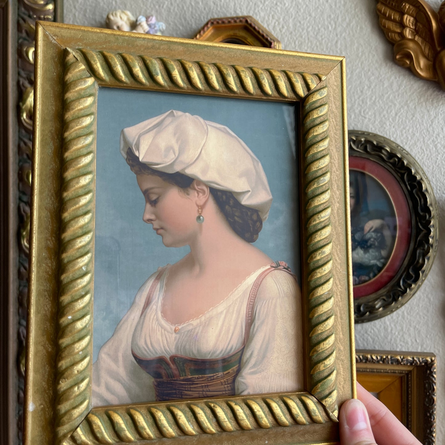 Vintage Style Woman looking down Portrait Framed