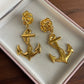 Vintage Gold anchor earrings with a rose design