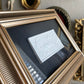 Gold Framed plaster intaglio with black textured background art work