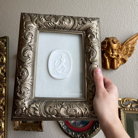 Vintage ornate plaster framed Intaglio