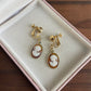 Vintage Cameo gold tone clipon/screwback earrings